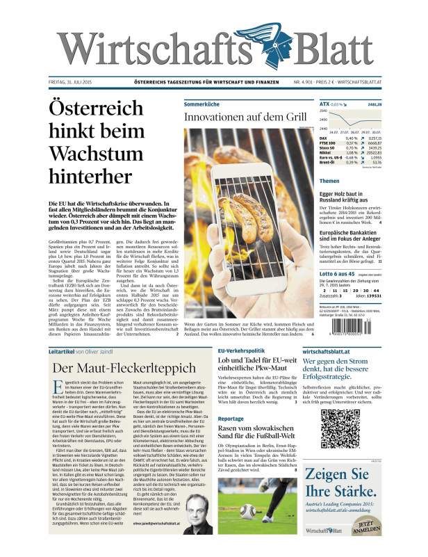 Würste werden auf einem Grill zubereitet.