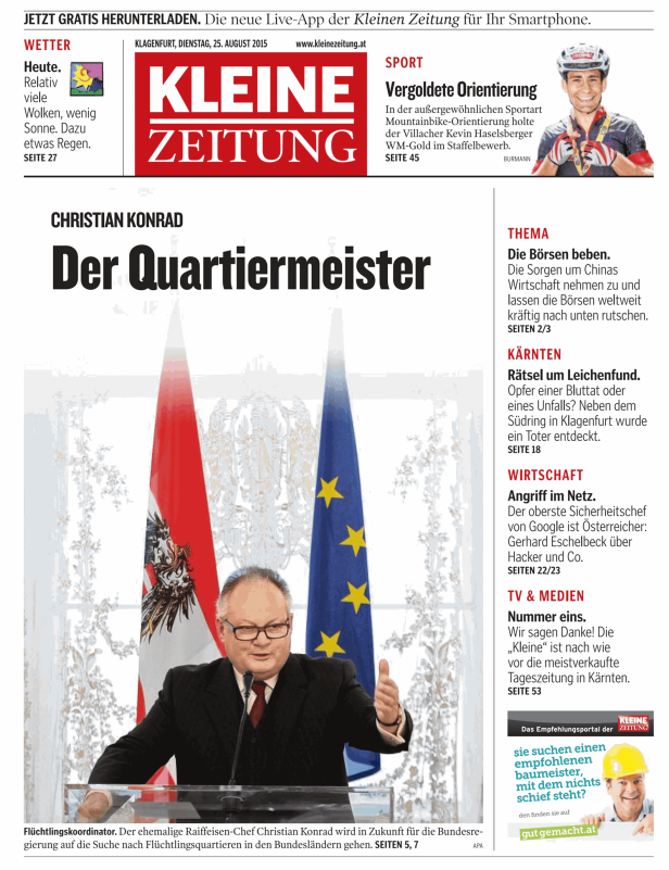 Christian Konrad bei einer Rede vor der österreichischen und europäischen Flagge.
