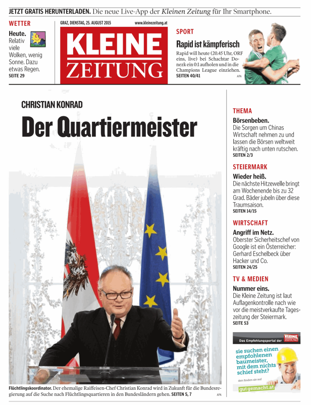 Christian Konrad bei einer Rede vor der österreichischen und der EU-Flagge.