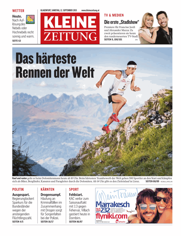 Ein Bergläufer beim „Dolomitenmann“-Wettbewerb auf einem steinigen Pfad.