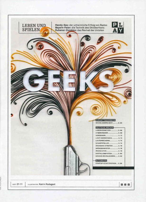 Das Wort „Geeks“ quillt als bunte Papierstreifen aus einer Pistole.