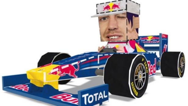 Ein Formel-1-Rennwagen im Red-Bull-Design mit einem stilisierten Fahrer-Kopf.