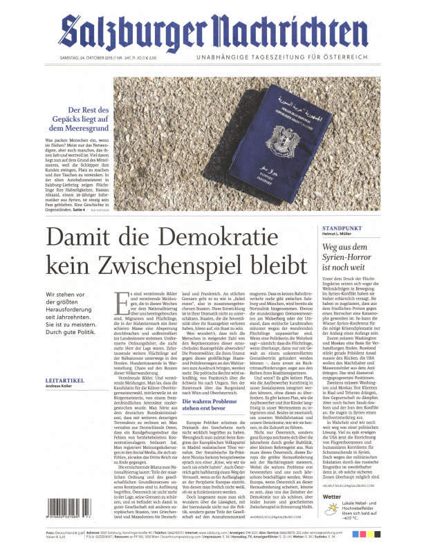 Ein syrischer Reisepass liegt auf steinigem Untergrund.