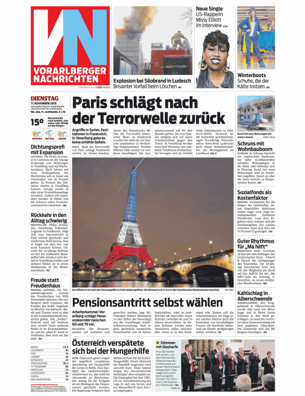 Der Eiffelturm leuchtet in den französischen Nationalfarben nach den Terroranschlägen in Paris.