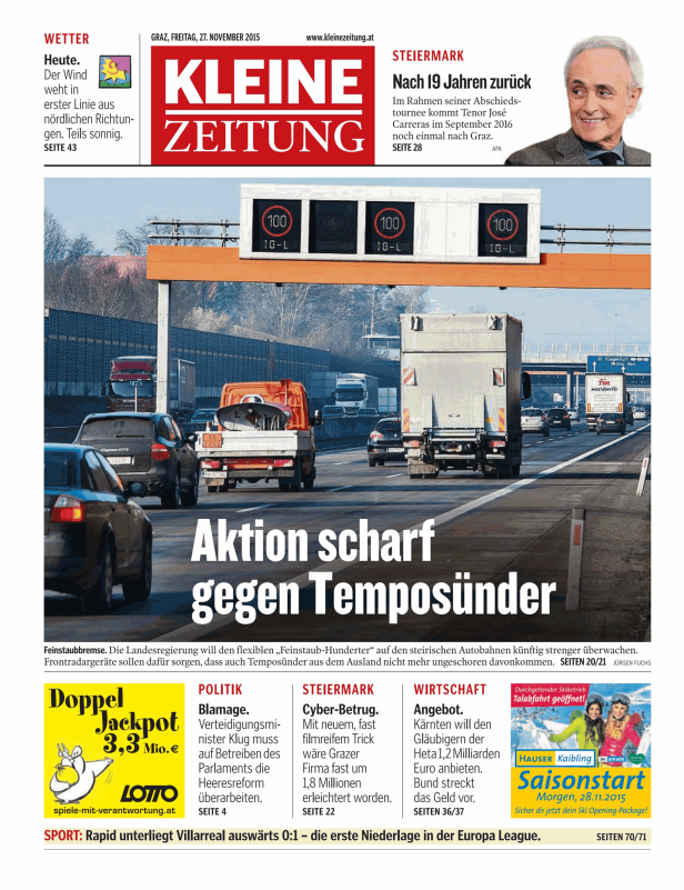 Autobahn mit Fahrzeugen unter einer Schilderbrücke mit Geschwindigkeitsbegrenzung 100 km/h.