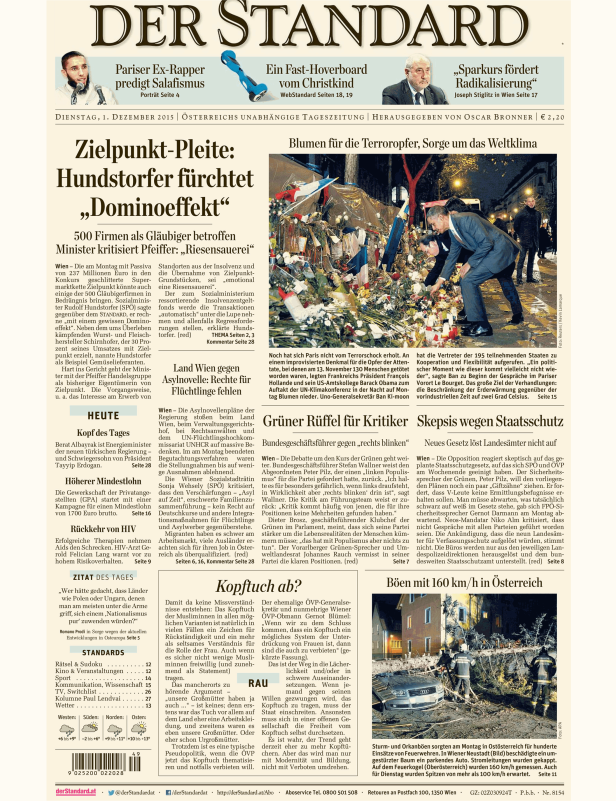 Eine Gedenkstätte mit Blumen und Flaggen für die Terroropfer in Paris.