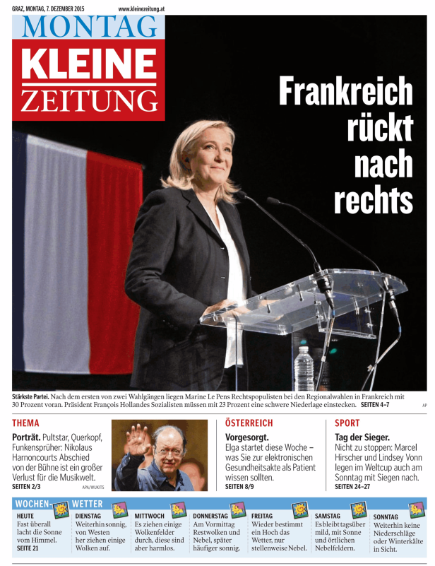 Marine Le Pen spricht vor einer französischen Flagge.