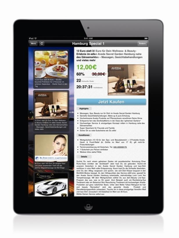 Daily Deal - iPad-App - Launch Juni 2011 Ein iPad zeigt eine Angebotsseite für Wellness- und Beauty-Erlebnisse im Aveda Secret Garden Hamburg.