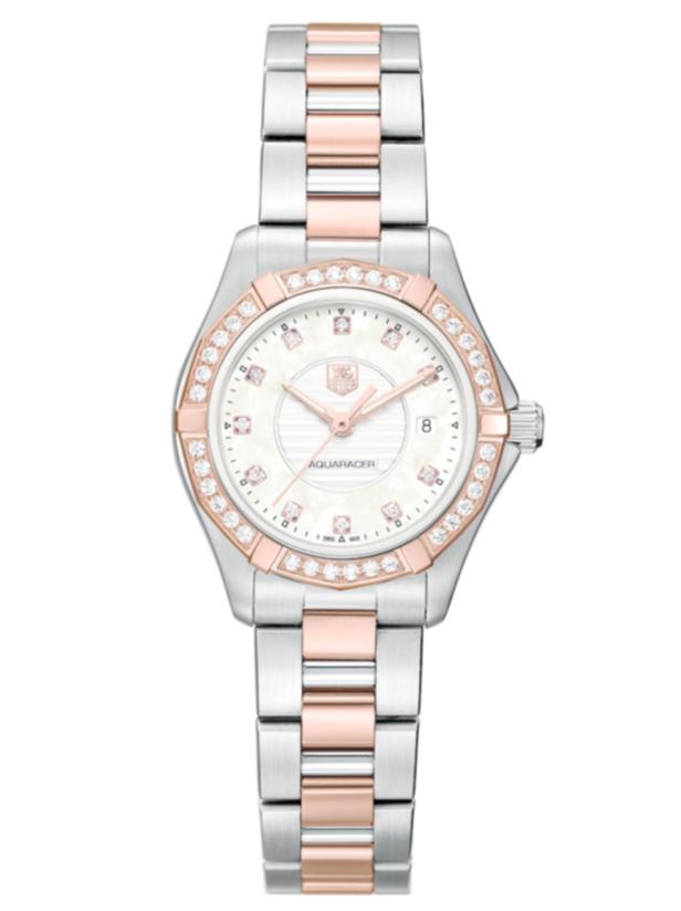 Eine silberne TAG Heuer Aquaracer Damenuhr mit roségoldenen Akzenten und Diamanten.
