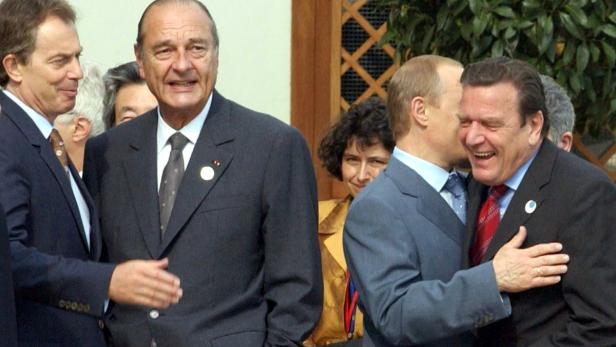 Tony Blair, Jacques Chirac, Wladimir Putin und Gerhard Schröder bei einem Treffen.