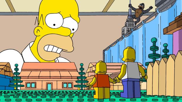 Eine Lego-Version von Springfield mit einem riesigen Homer und einem Gorilla auf dem Empire State Building.