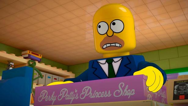 Ein Lego-artiger Comic-Charakter steht vor „Perky Patty's Princess Shop“.