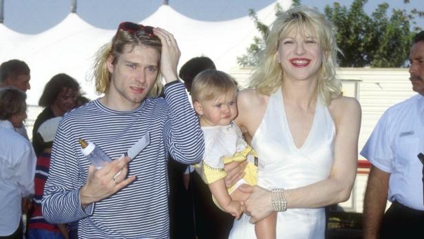 Kurt Cobain, Courtney Love und ihre Tochter Frances Bean Cobain im Jahr 1993.