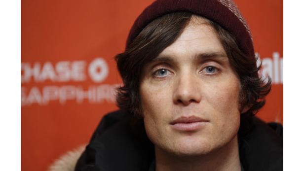 Porträt von Cillian Murphy mit einer dunklen Mütze.
