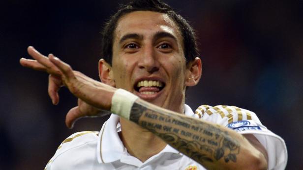 Ángel Di María, ein Fußballspieler von Real Madrid, jubelt mit erhobenem Arm.