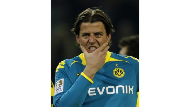 Ein Fußballspieler von Borussia Dortmund mit besorgter Miene.