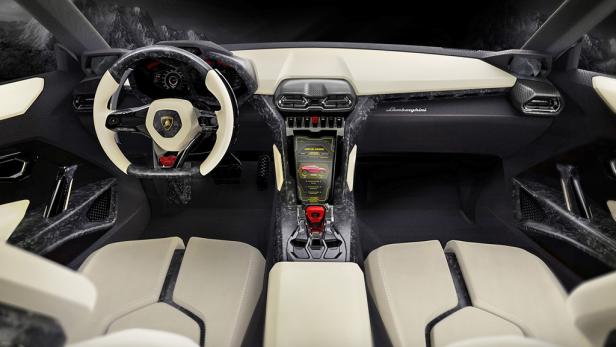 Innenansicht eines Lamborghini-Sportwagens mit hellem Leder und Carbon-Elementen.