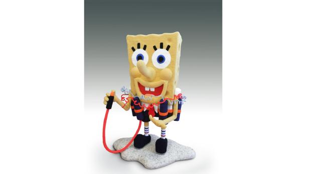 Eine gehäkelte Spongebob Schwammkopf-Figur mit Tauchausrüstung und rotem Schlauch.