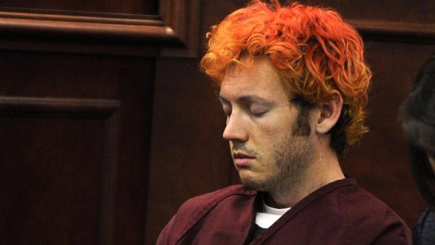 James Holmes erschien am Montag erstmals vor Gericht. Blutbad: Batman-Darsteller besuchte Opfer