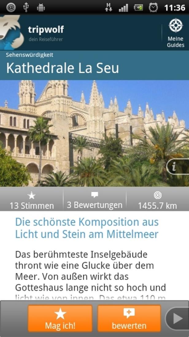 tripwolf.com - Android-App Die Kathedrale La Seu auf Mallorca, umgeben von Palmen, an einem sonnigen Tag.