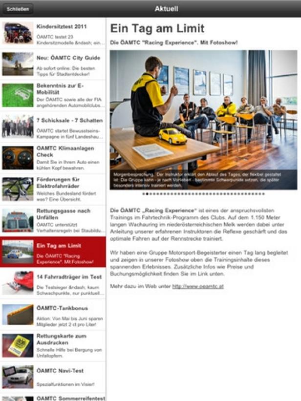 auto touring - ÖAMTC - iPad-Version - evolaris next level Ein Instruktor erklärt einer Gruppe von Personen die ÖAMTC „Racing Experience“.