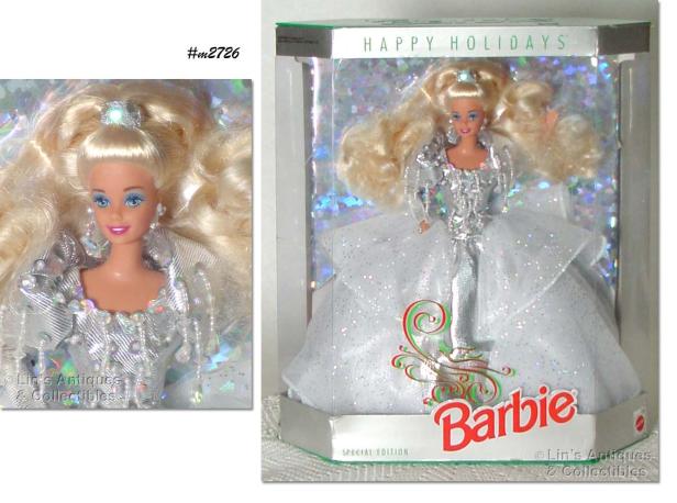 Eine „Happy Holidays Special Edition“ Barbie-Puppe in festlicher Verpackung.