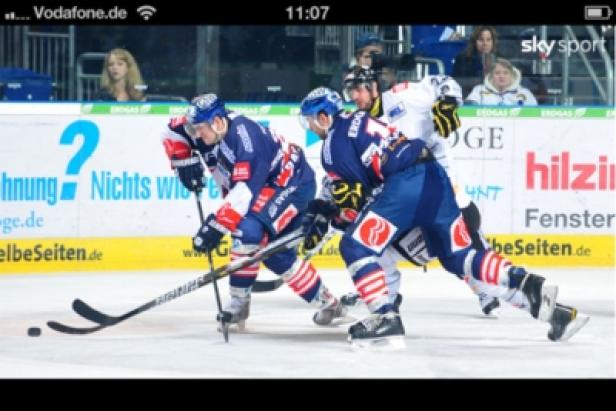 Sky Sport Mobile-App Eishockeyspieler kämpfen um den Puck auf dem Eis.