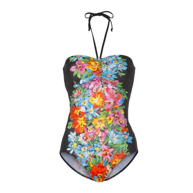 Ein trägerloser Badeanzug mit einem bunten Blumenmuster auf schwarzem Grund.