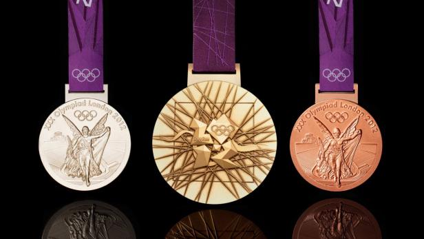Drei Medaillen der Olympischen Sommerspiele 2012 in London in Gold, Silber und Bronze.