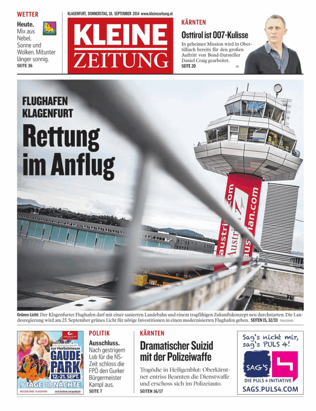 Der Kontrollturm des Flughafens Klagenfurt mit dem Schriftzug „austrian.com“.