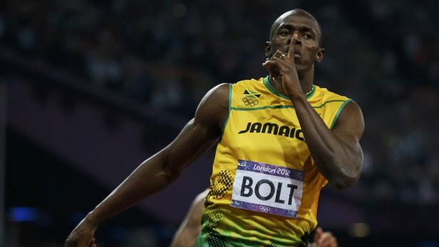 Usain Bolt bei den Olympischen Spielen 2012 in London mit einem Finger vor dem Mund.