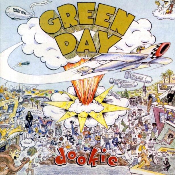 Das Cover des Albums „Dookie“ von Green Day zeigt ein chaotisches Cartoon-Gemälde mit einem explodierenden Flugzeug.