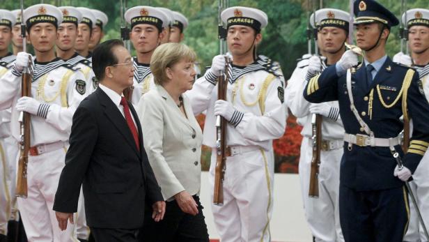 Merkel für Milliardenabschlüsse in Peking