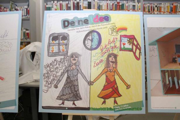 Ein Kinderplakat zum Thema Raumluft, mit Zeichnungen von guter und schlechter Luft.