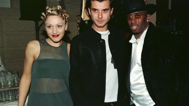 Gwen Stefani, Gavin Rossdale und Sean Combs (P. Diddy) posieren zusammen.