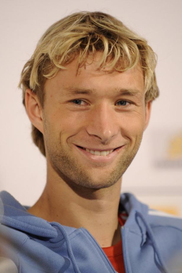 Porträt des lächelnden Tennisspielers Benjamin Becker.