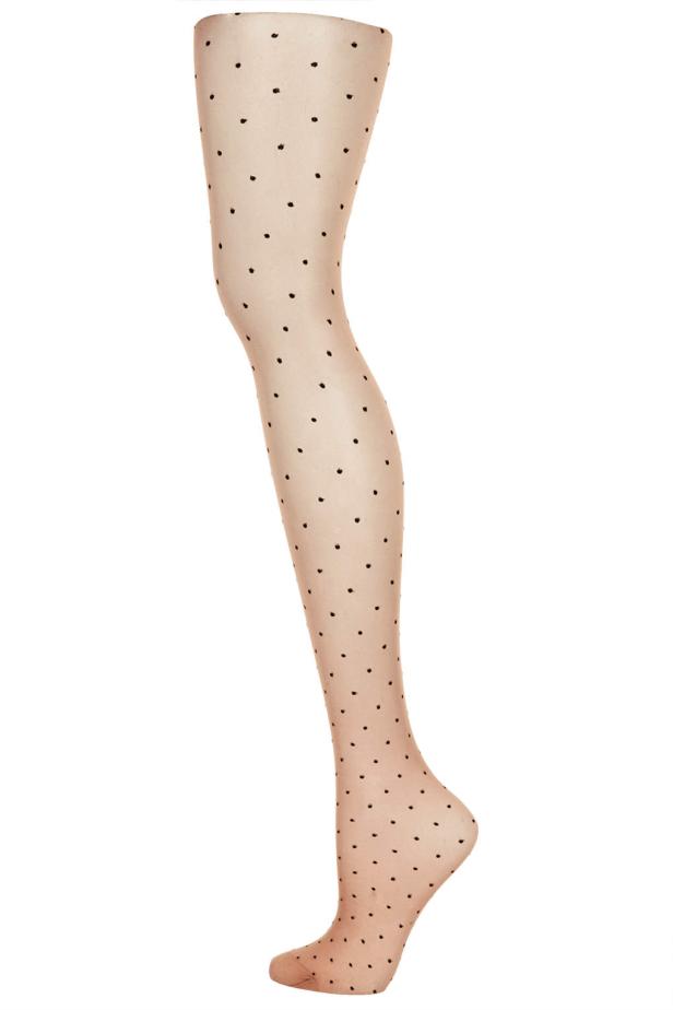 Ein Bein, bekleidet mit einer transparenten Strumpfhose mit schwarzen Punkten.