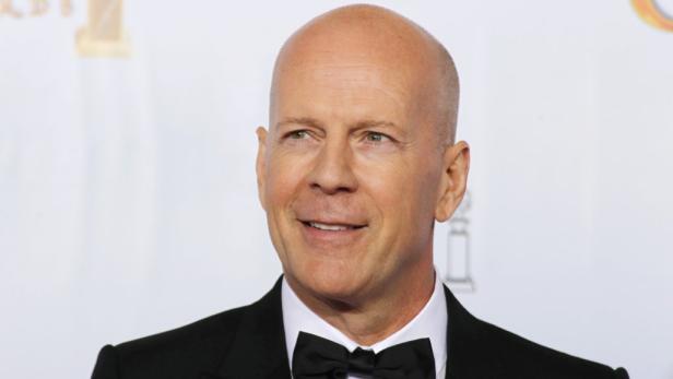 Porträt von Bruce Willis mit Fliege.