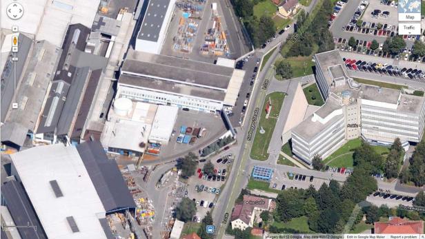 Luftaufnahme eines Industriegebiets mit dem Andritz-Gebäude in Graz, Österreich.