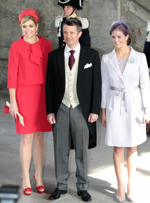 Königin Máxima, Prinz Frederik und Prinzessin Madeleine posieren für ein Foto.