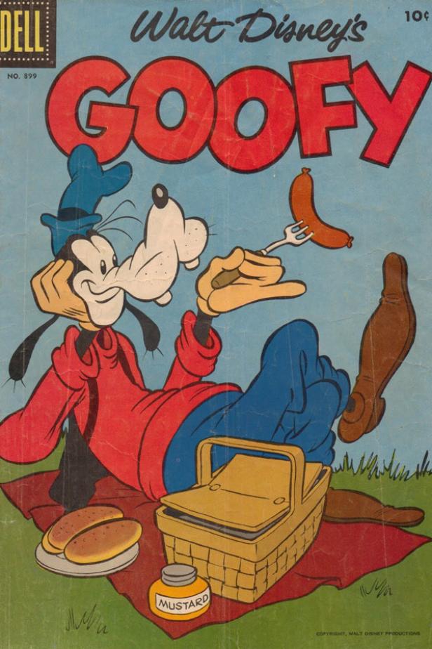 Goofy macht ein Picknick und hält eine Wurst auf einer Gabel.