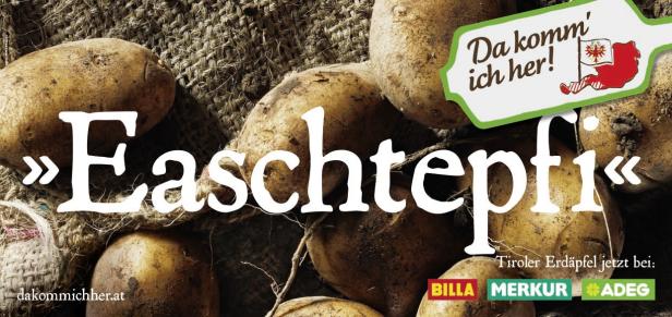 Mehrere Tiroler Erdäpfel liegen auf einem Jutesack.