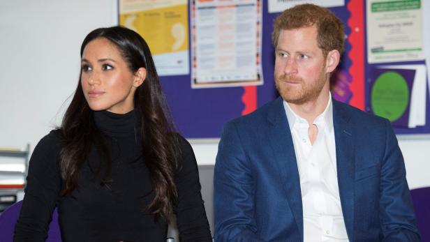 Britain's Prince Harry and his fiancee Megan Markl