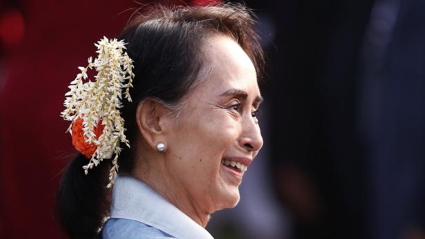 Myanmar's State Counsellor Aung San Suu Kyi smiles