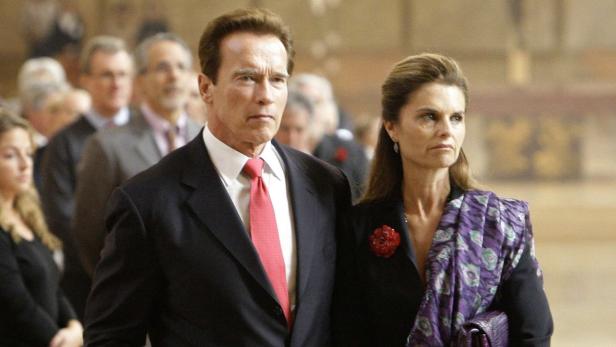 REUTERSCalifornia Governor Arnold Schwarzengger and his wife Maria Shriver (R) attend funeral services for Italian film producer Dino De Laurentiis in Los Angeles in this November 15, 2010 file photo. Shriver filed for divorce in Los Angeles July 1, 2011