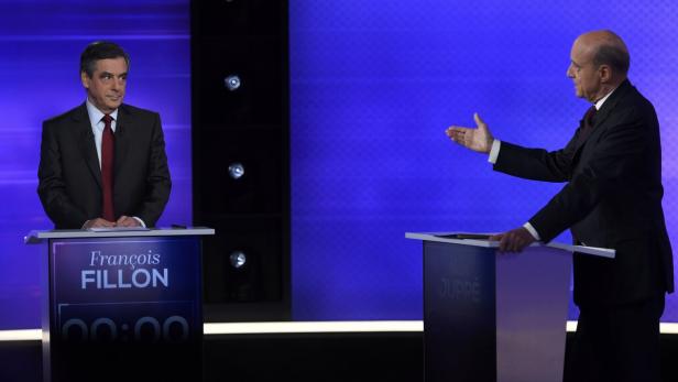 François Fillon und Alain Juppé während einer Fernsehdebatte.