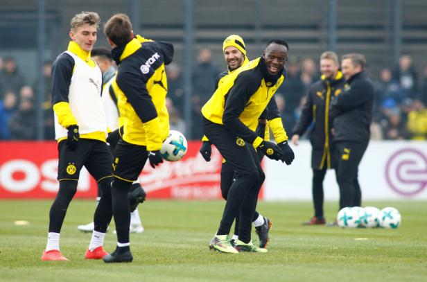 Usain Bolt participates in a training session with Borussia Dortmund