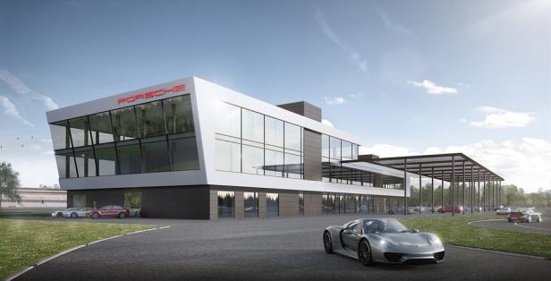 Ein Porsche 918 Spyder vor einem modernen Porsche-Zentrum.