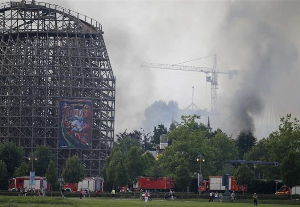 Smoke rises from a fire at the Europa Park in Rust