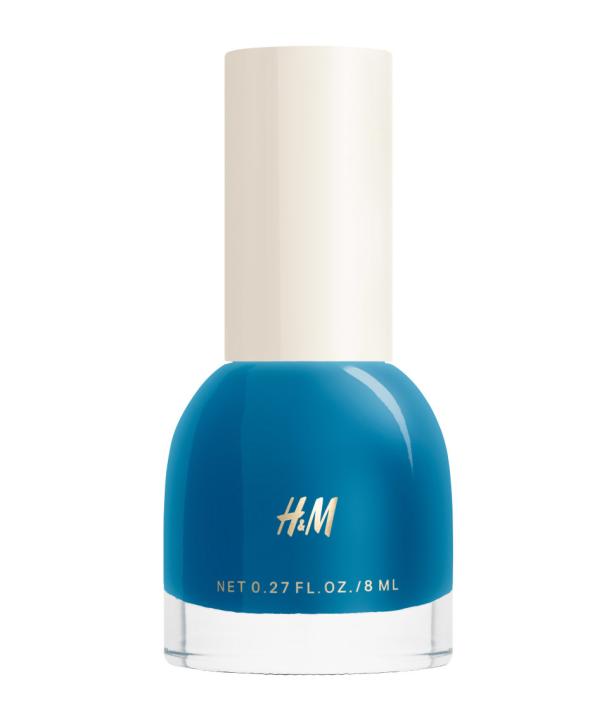 Eine Flasche blauer Nagellack von H&M.